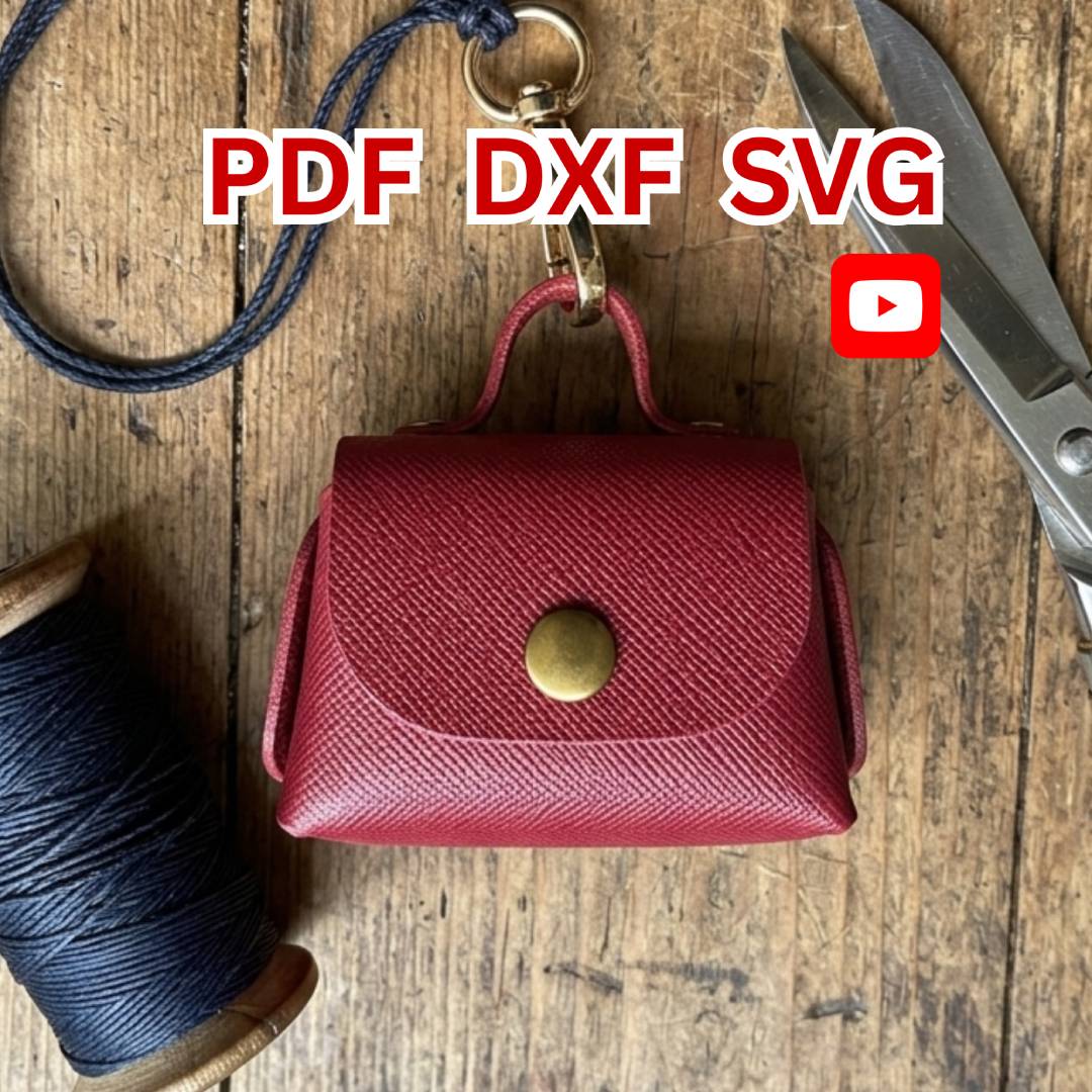 Handmade leather micro bag charm.