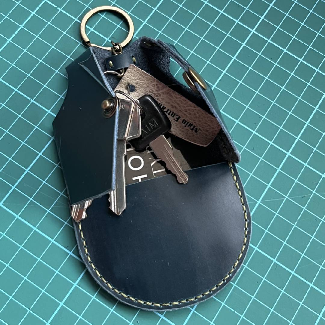 handmade leather wallet for card and keys.