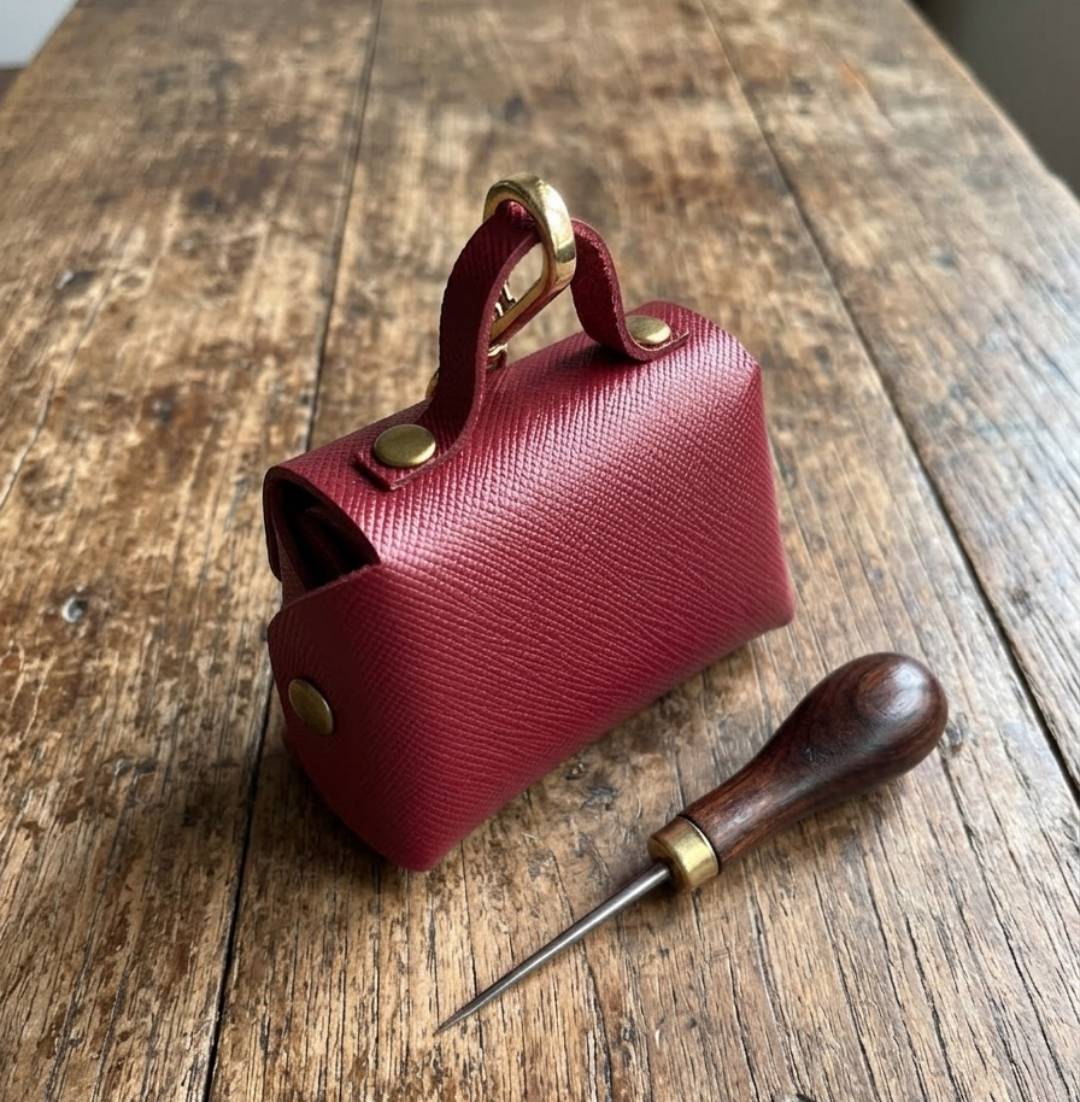 Back view of a handmade no-stitch airpod bag.