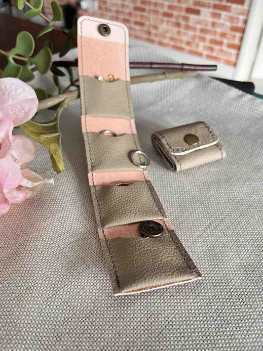 Leather purse with multiple small pockets to keep small accessories like earrings, rings, bracelets and necklace.