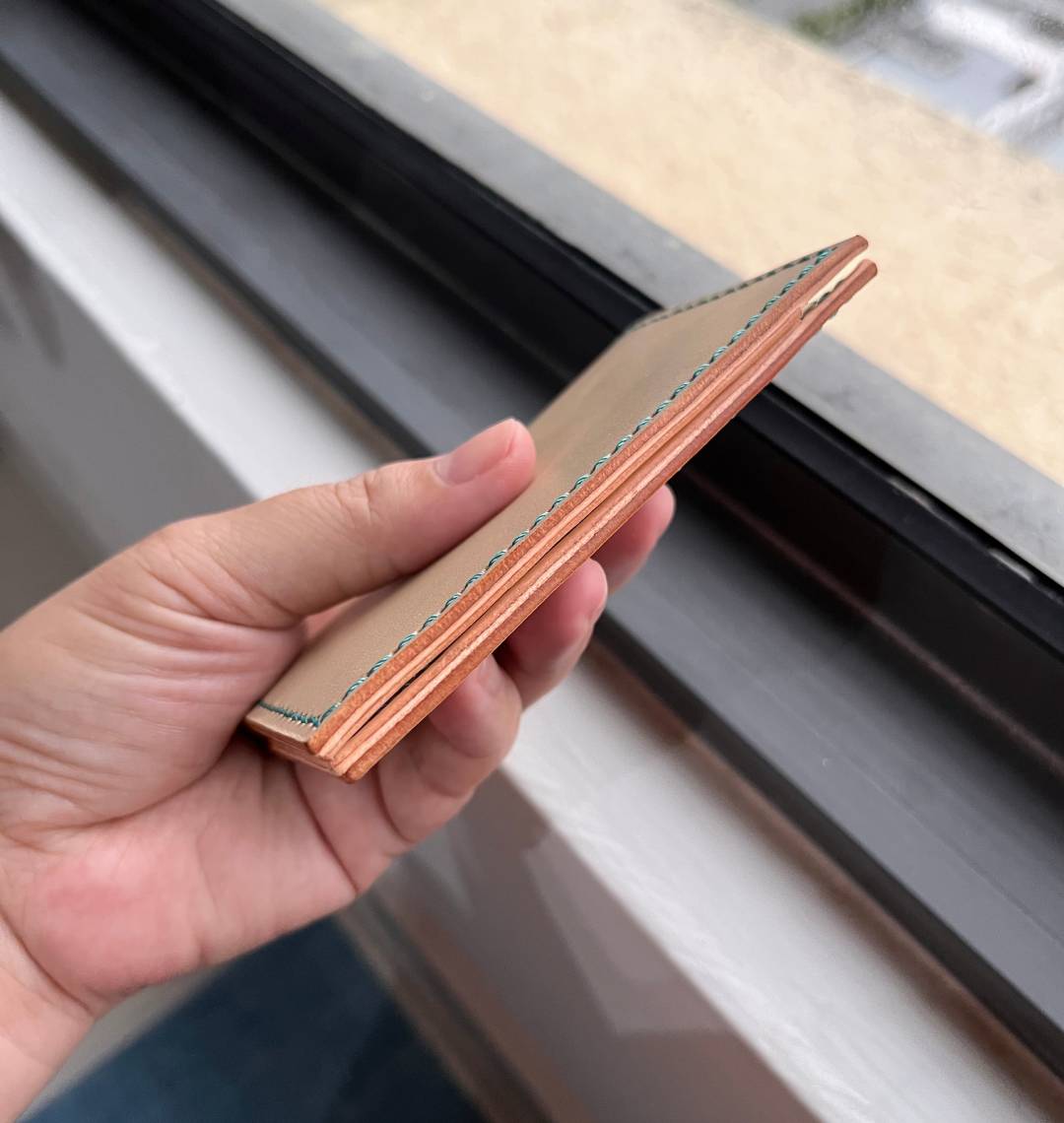 Hand stitch a minimalist leather card wallet.