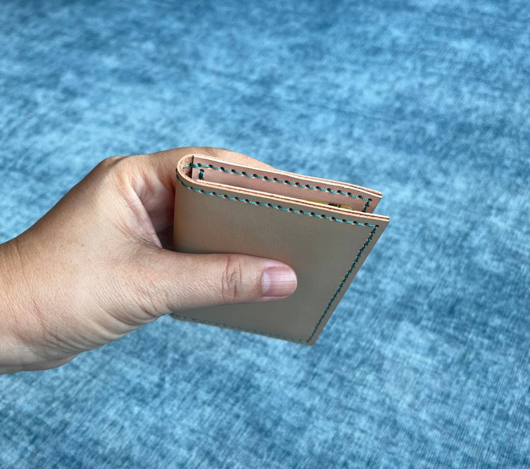 A slim card wallet made from scrap leather.