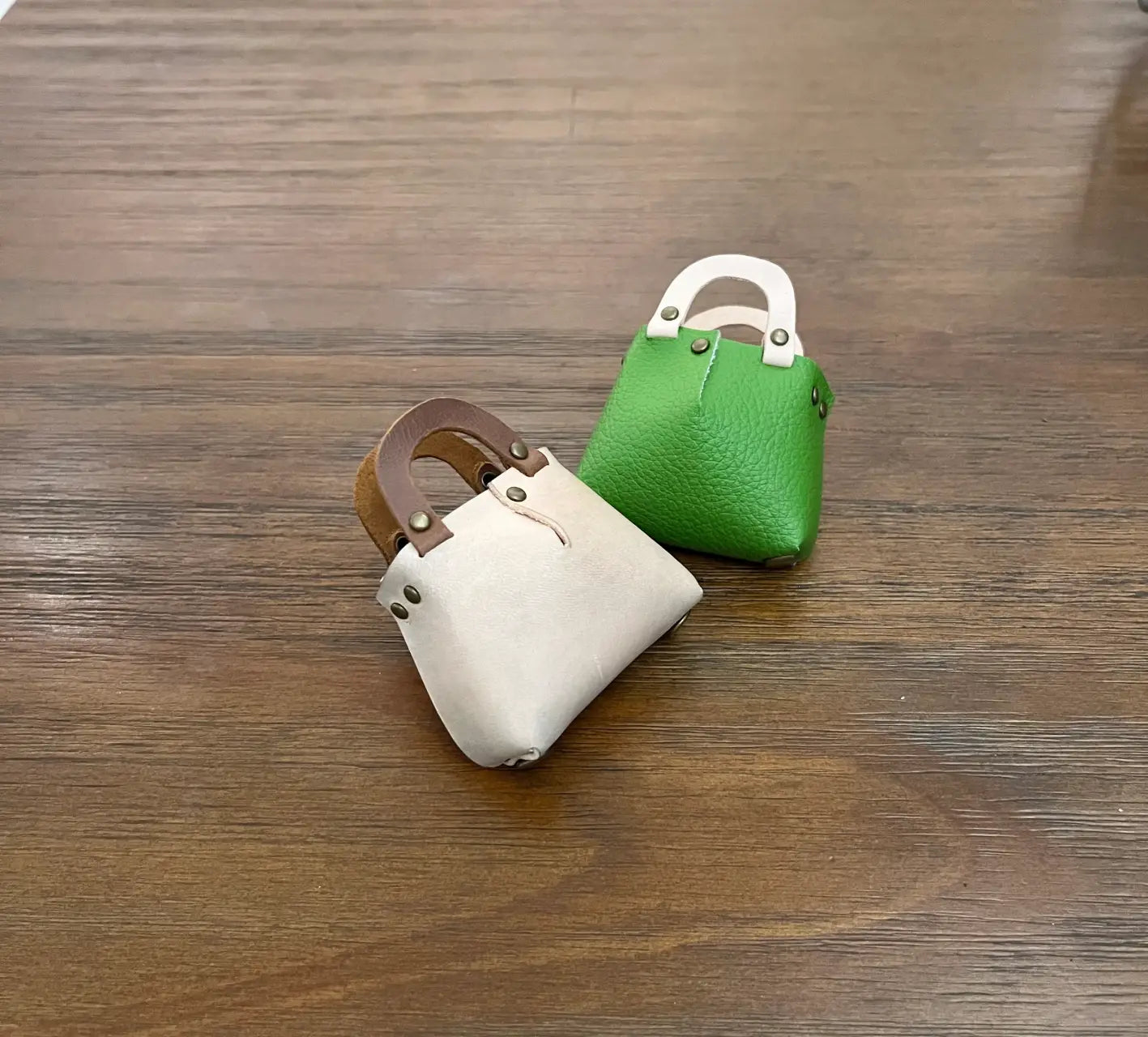 Close-up of mini bag assemble using just rivets.