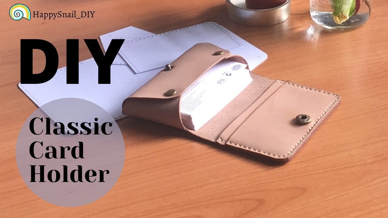 Minimalist leather card holder PDF pattern showing finished product with cards.