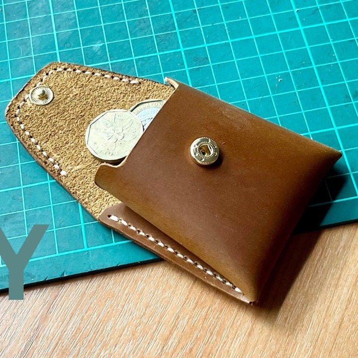 Simple leather coin bag pattern designed for first-time leatherworkers.