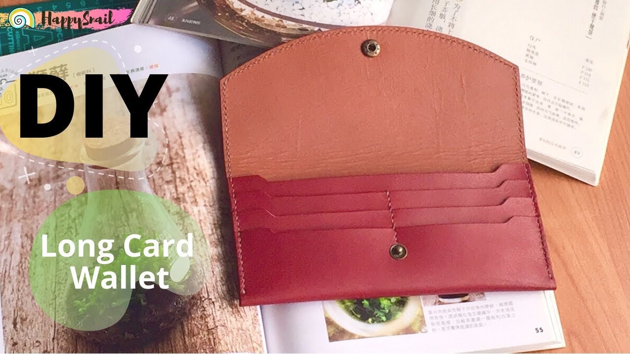 Open long leather card wallet with multiple card slots visible