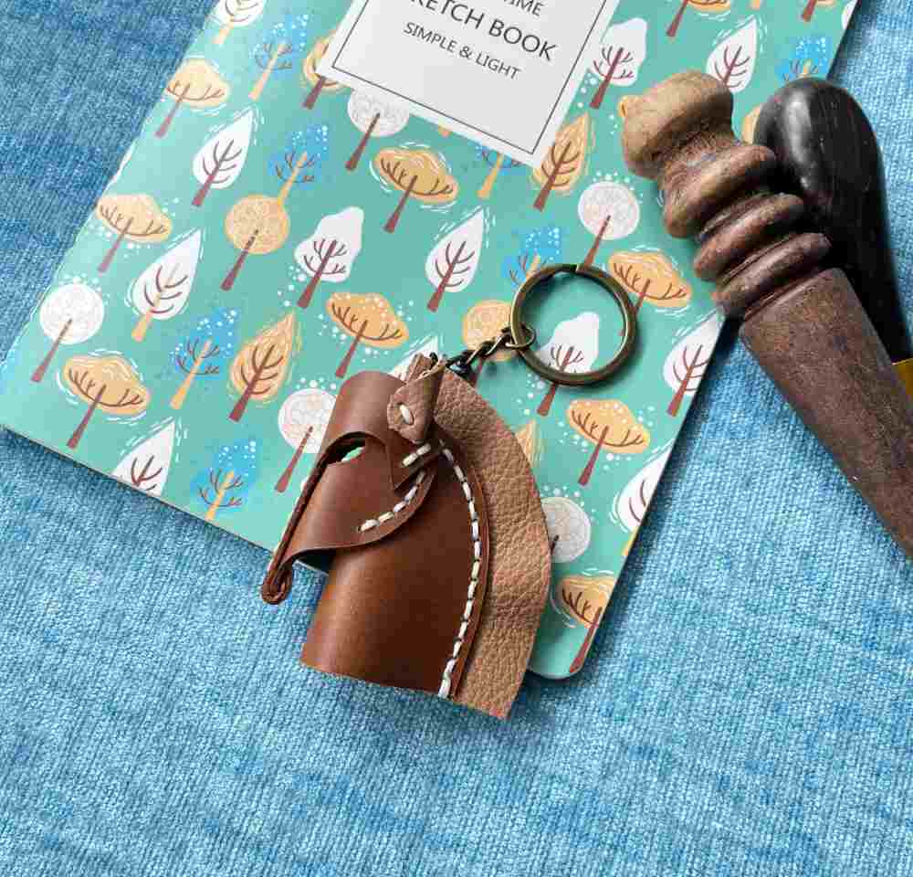 High-quality leather horse accessory with a textured dark brown mane.