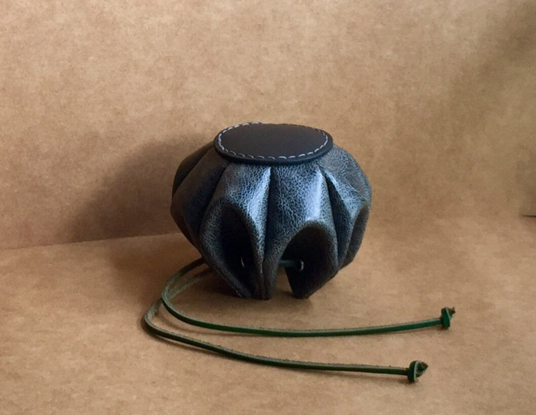 DIY leather gift bag accessory with a minimalist design.