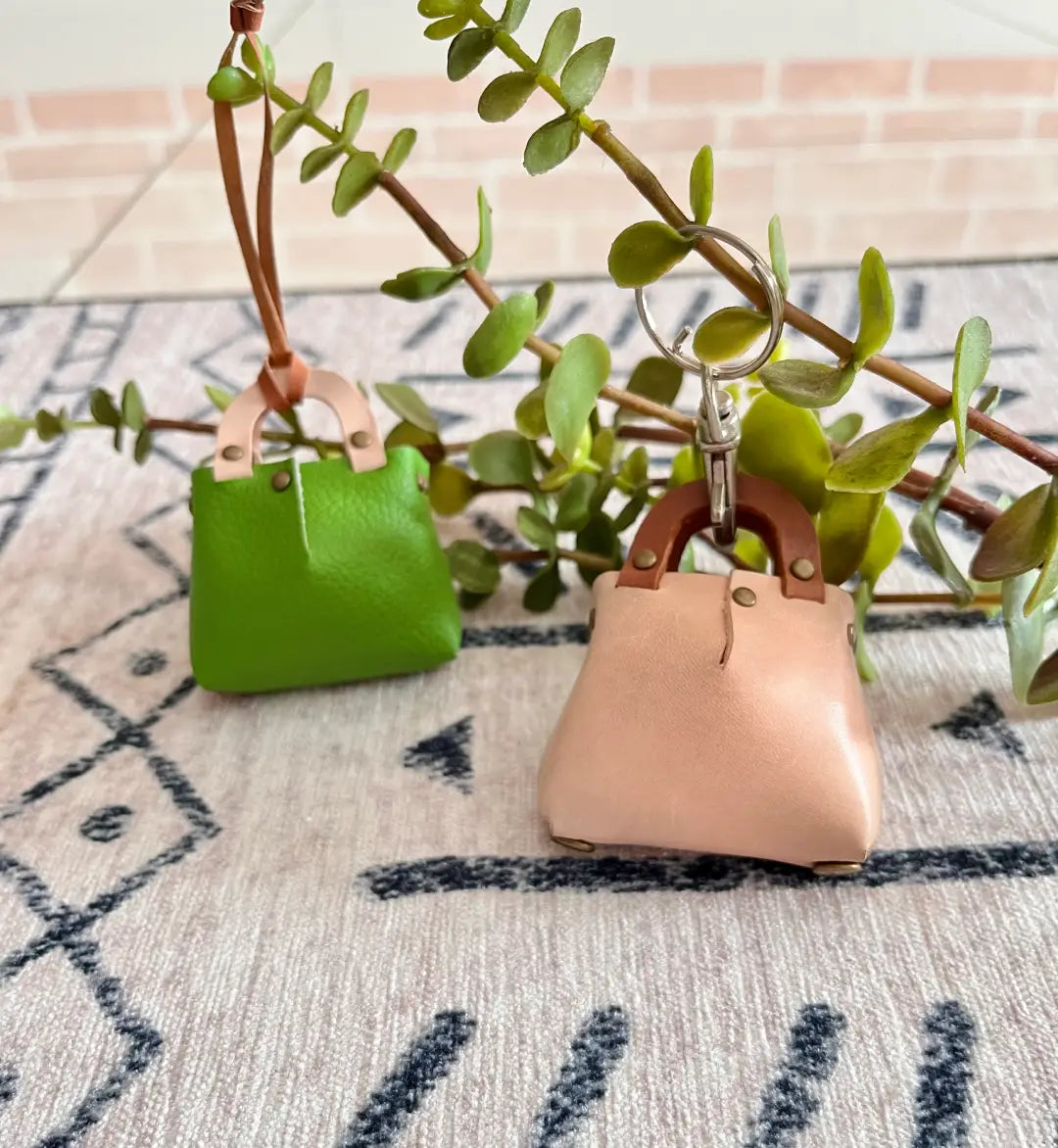 Miniature leather bag pattern sized perfectly as a doll accessory or bag charm.