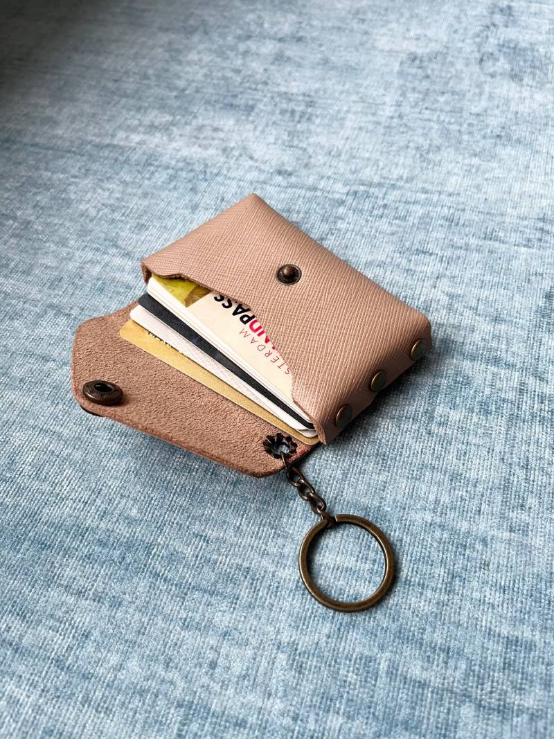 no-stitch leather card holder showing smooth leather finish.