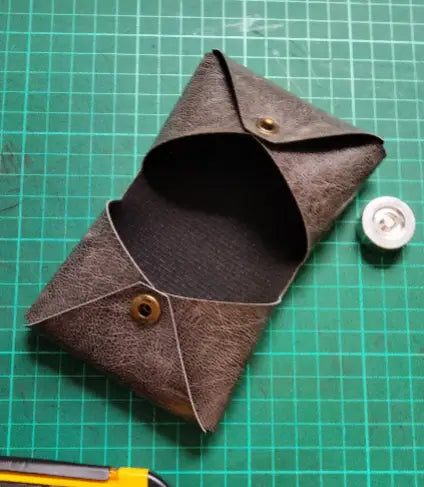 Close-up of edge detail on no sew leather card wallet