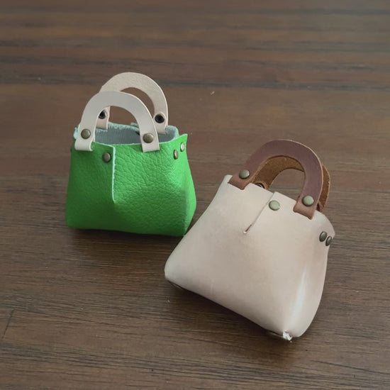 Elegant women's leather bag charm.