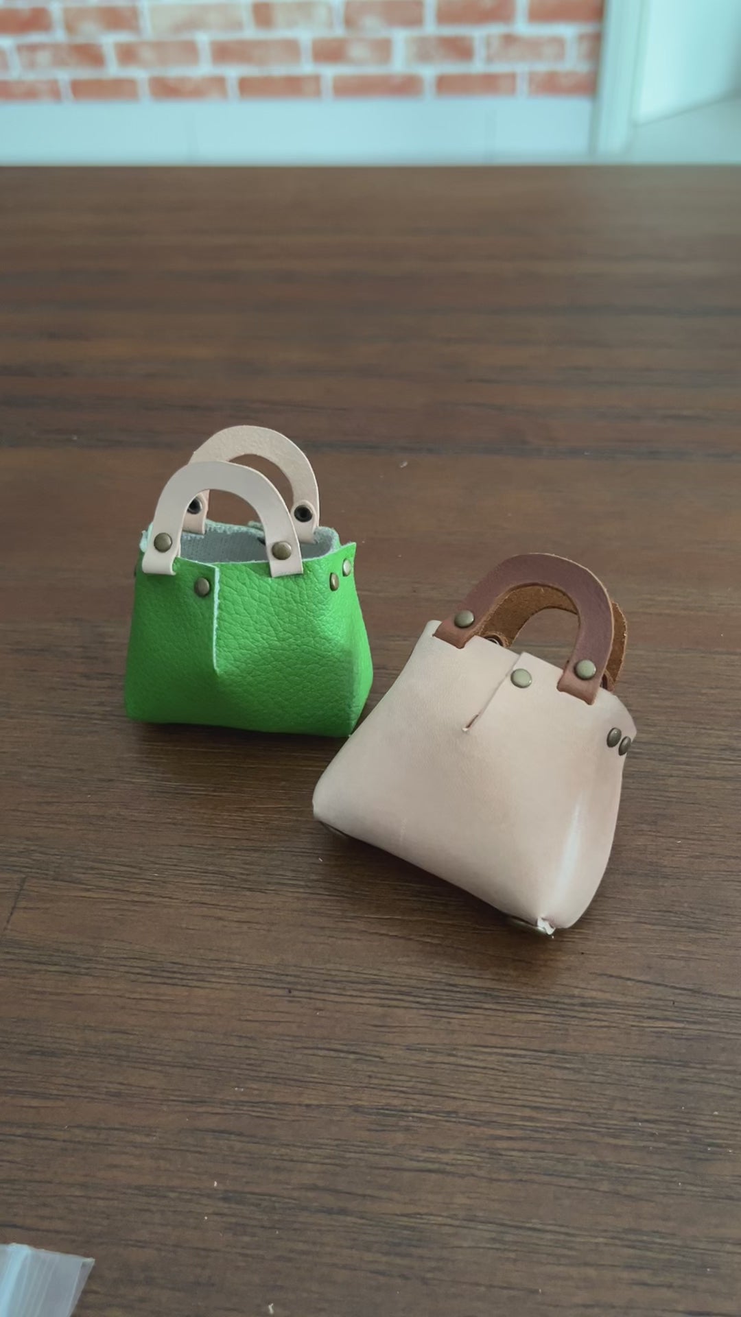 Elegant women's leather bag charm.