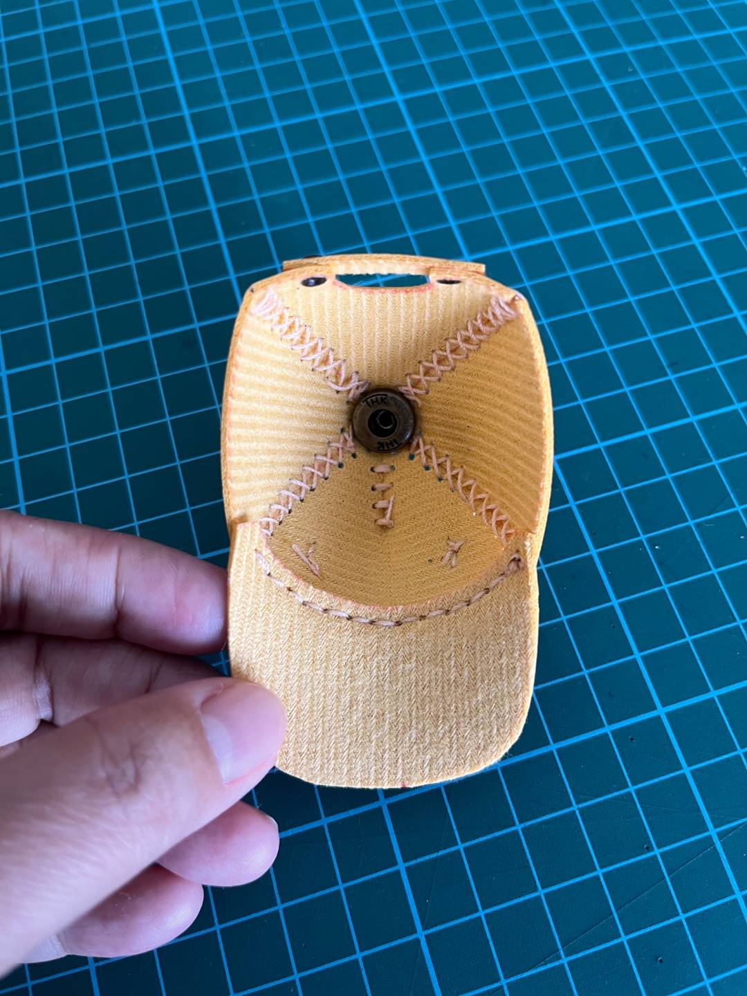 inside of a baseball cap