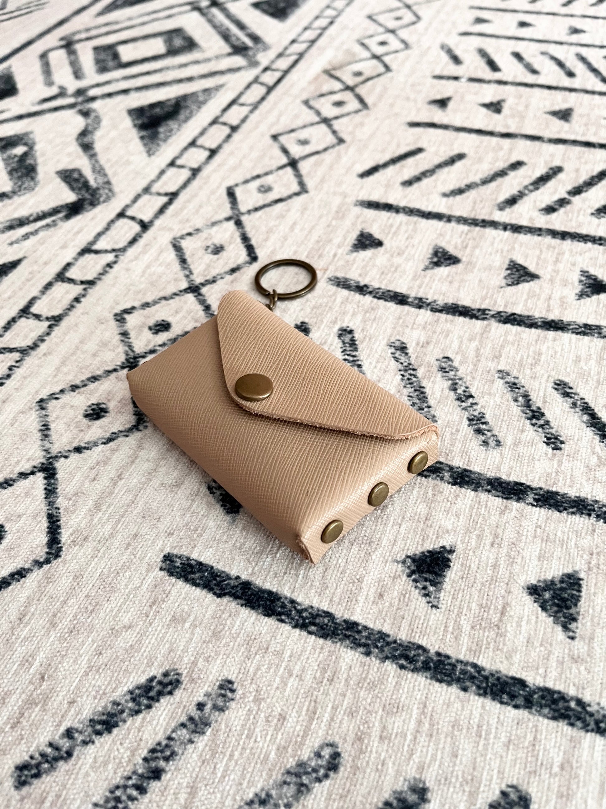 size view of a leather wallet to show compact minimalist size