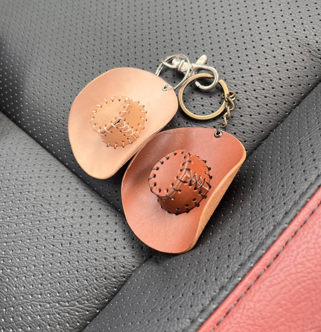 Finished leather hat keychain with SVG file.